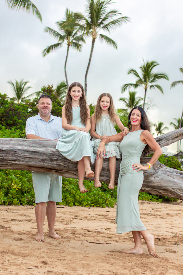 A family enjoying an early morning portrait session in Maui