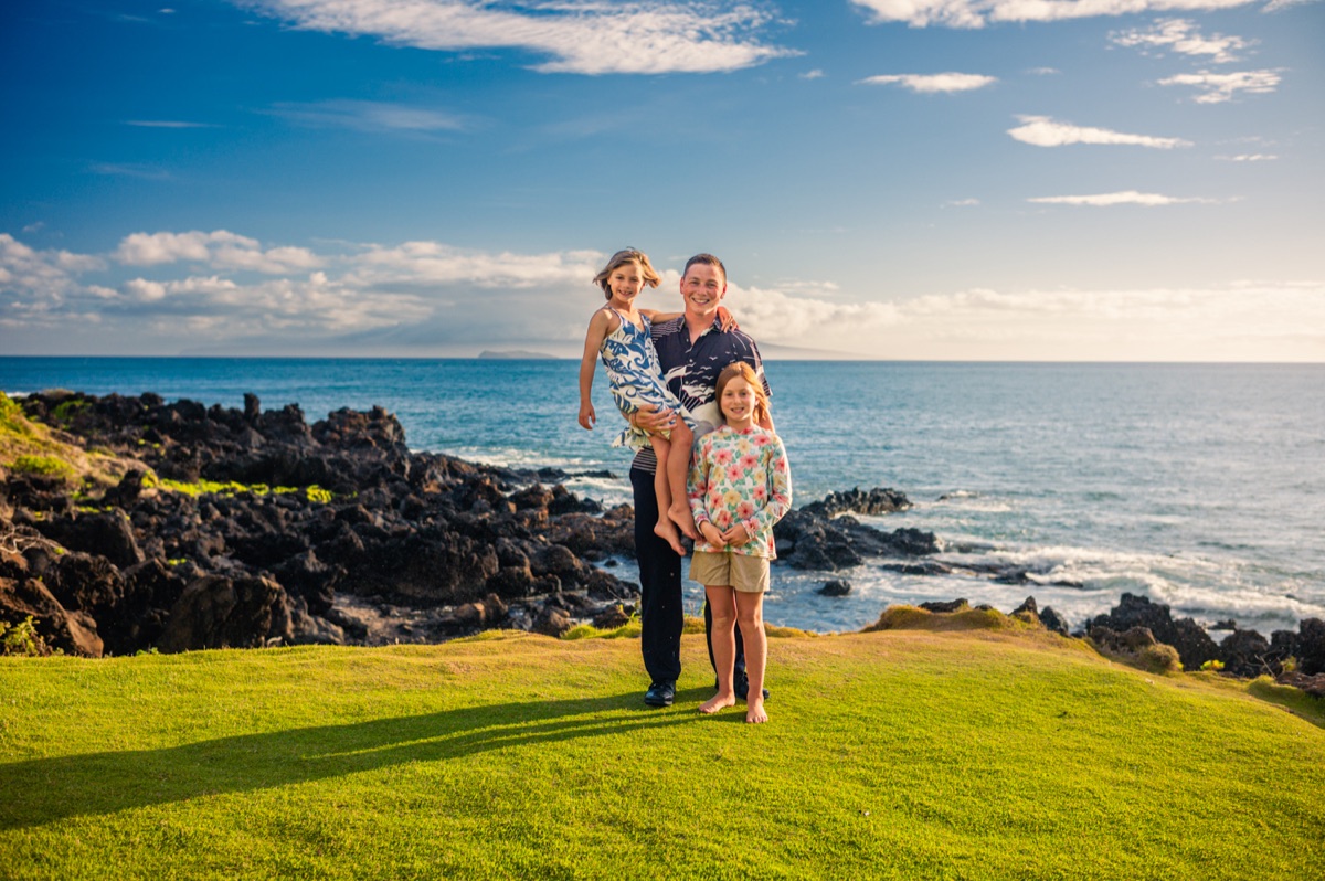 A family photographed above the Maui shoreline during a recent session